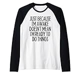 Lustiger Spruch 'Lazy Zitat Just Because I'm Awake Doesn't Mean' Raglan