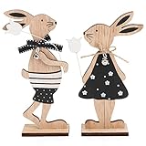 com-four® 2X Deko Aufsteller für Ostern - Osterhasen-Paar mit Blume - Zwei Osterhasen zum Hinstellen - Osterdekoration aus Holz (2 Stück - schwarz/weiß)